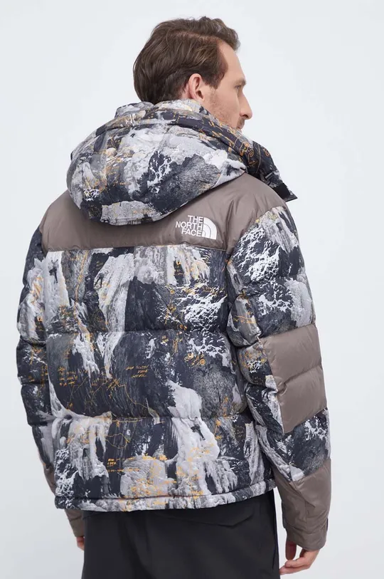 Пуховая куртка The North Face Подкладка: 100% Полиэстер Наполнитель: 80% Переработанный пух, 20% Переработанное перо Материал 1: 100% Полиэстер Материал 2: 100% Полиамид