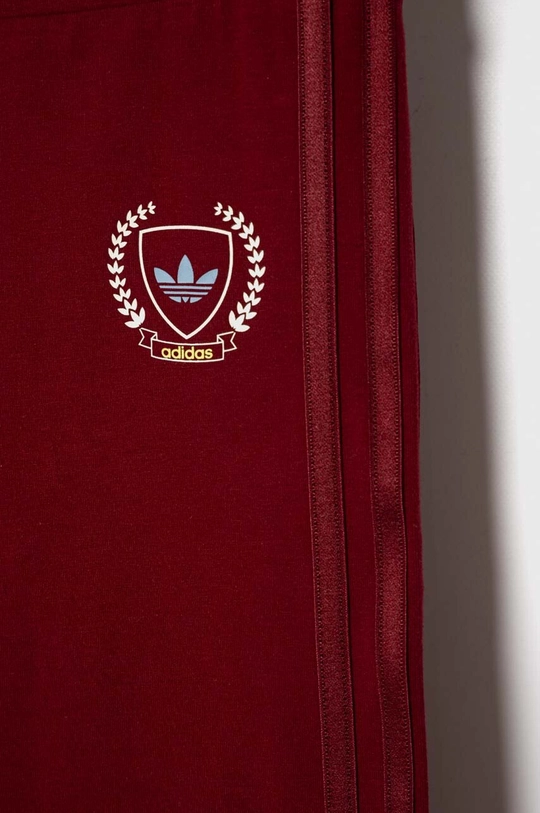 Дитячі легінси adidas Originals червоний