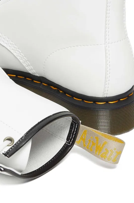 white Dr. Martens ankle boots 1460