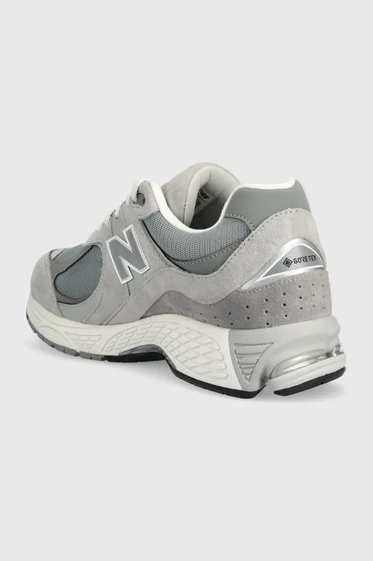 New Balance sneakersy M2002RXJ <p>Cholewka: Skóra zamszowa, Materiał tekstylny, Wnętrze: Materiał tekstylny, Podeszwa: Materiał syntetyczny</p>