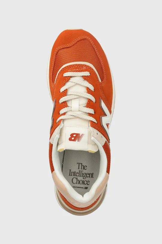 orange New Balance sneakers 574