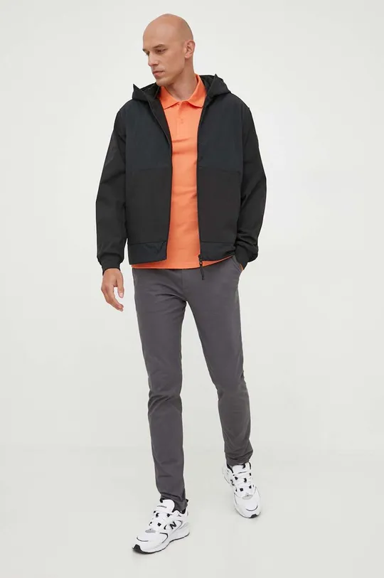 Хлопковое поло Calvin Klein Jeans оранжевый