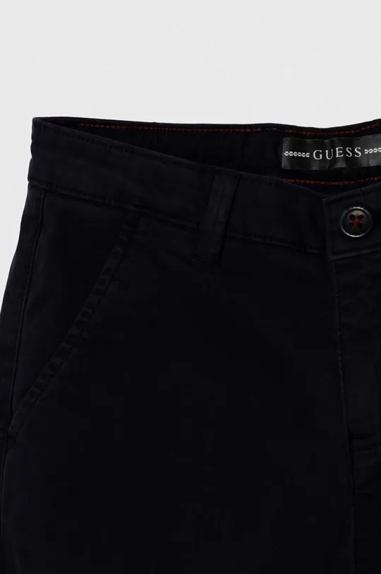 Детские брюки Guess  Основной материал: 98% Хлопок, 2% Эластан Подкладка кармана: 100% Хлопок