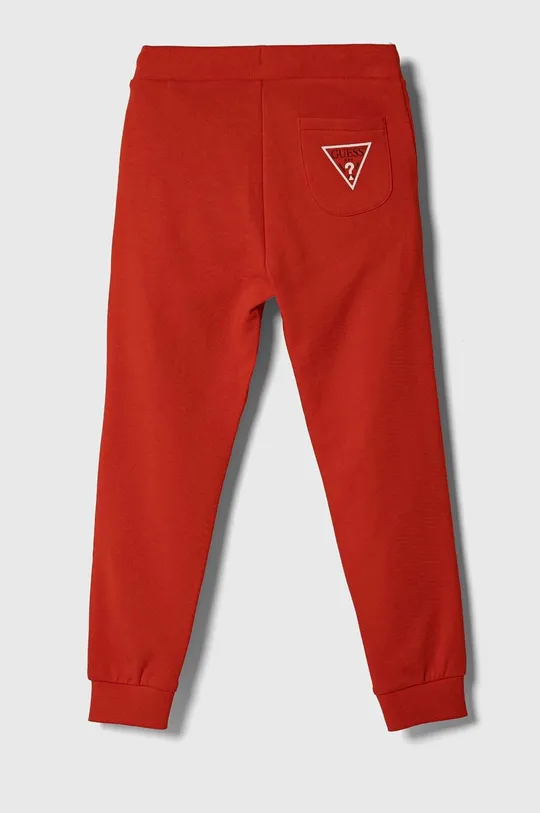 Guess spodnie dresowe bawełniane dziecięce czerwony