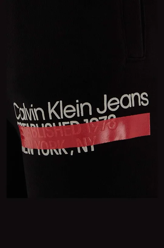 czarny Calvin Klein Jeans spodnie dresowe bawełniane dziecięce