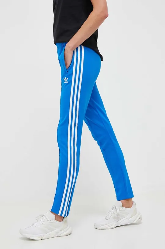 niebieski adidas Originals spodnie dresowe Damski
