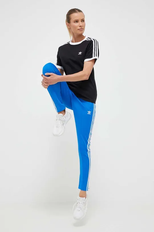 Tepláky adidas Originals modrá