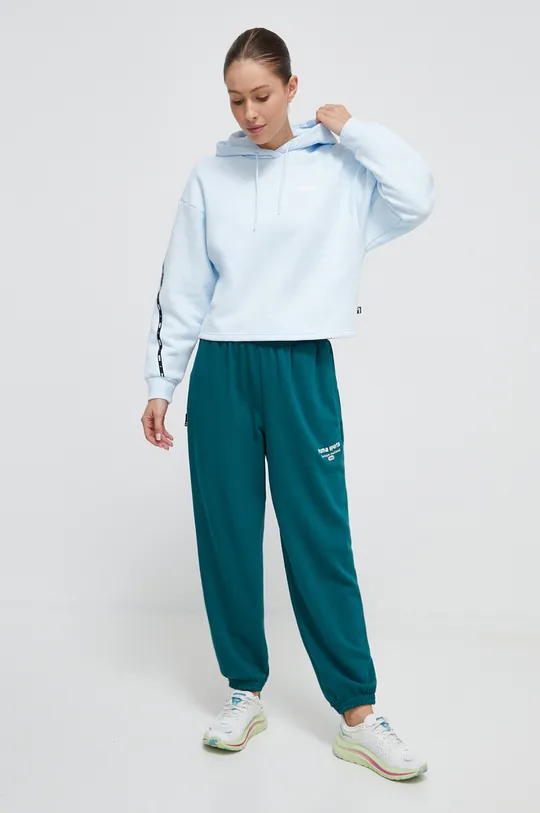 зелений Спортивні штани Puma Жіночий