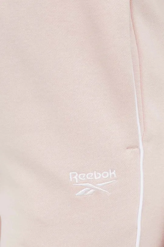 рожевий Спортивні штани Reebok