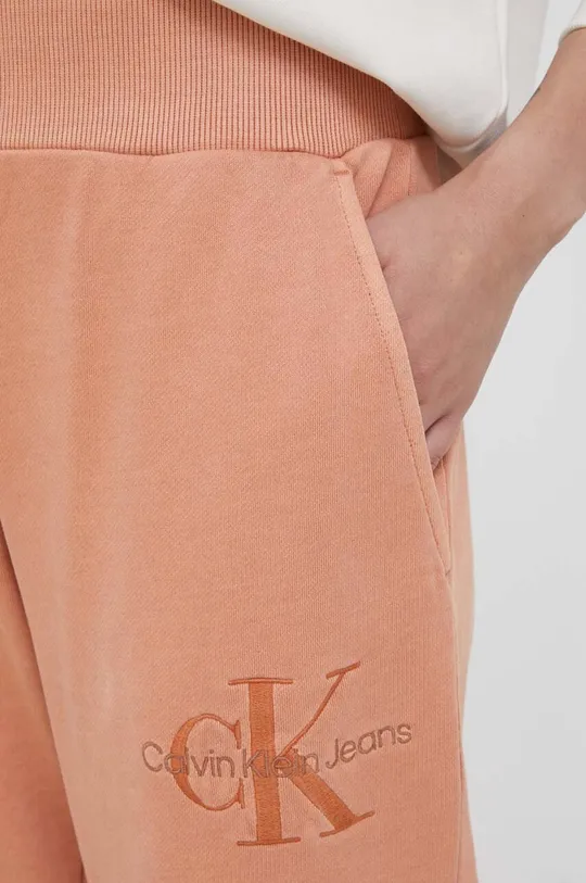 narančasta Pamučni donji dio trenirke Calvin Klein Jeans