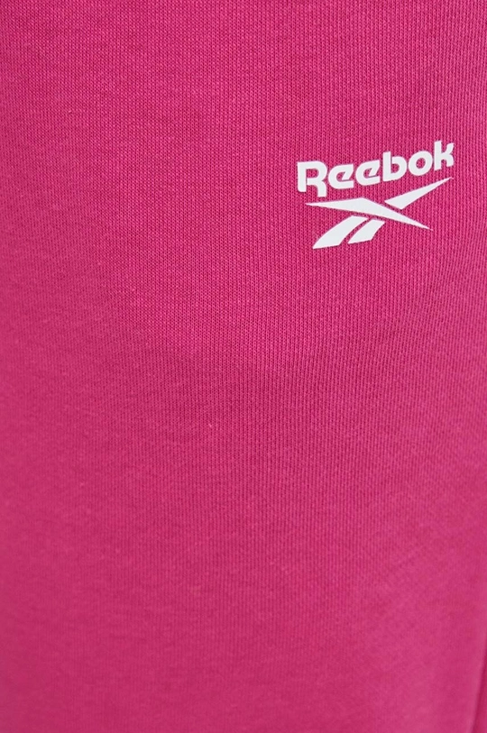 рожевий Спортивні штани Reebok