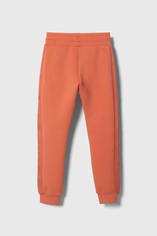 Дитячі спортивні штани Guess помаранчевий