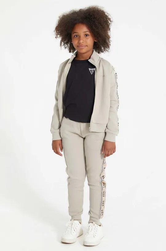 бежевий Дитячі спортивні штани Guess Для дівчаток