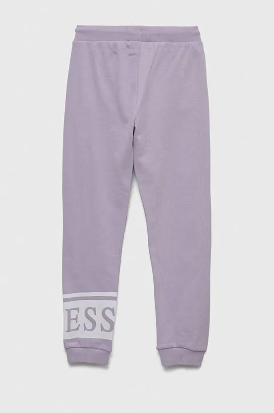 Дитячі бавовняні штани Guess фіолетовий