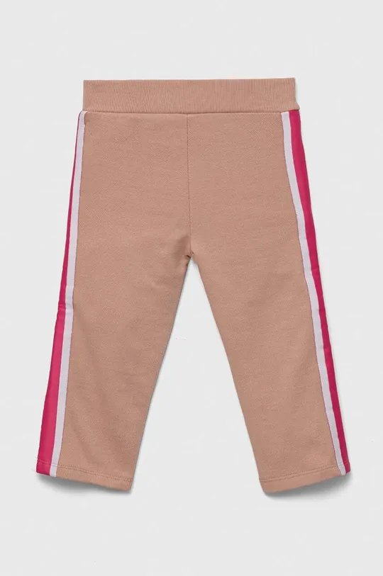 Детские хлопковые брюки Guess розовый