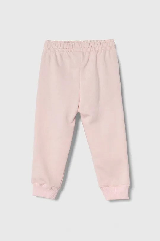 Дитячі спортивні штани Lacoste рожевий