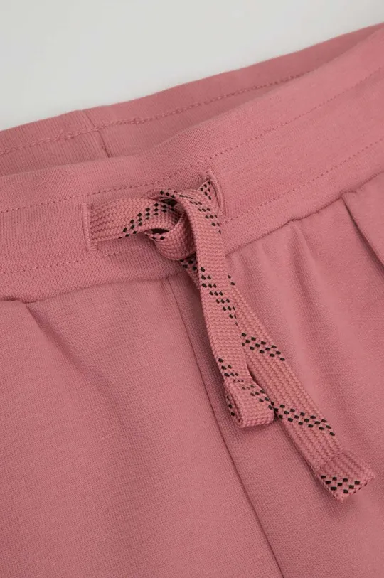 różowy Coccodrillo spodnie dresowe bawełniane dziecięce