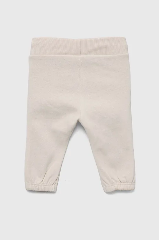 Calvin Klein Jeans spodnie dresowe niemowlęce beżowy