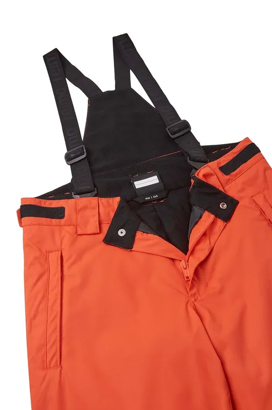 помаранчевий Дитячі лижні штани Reima Wingon
