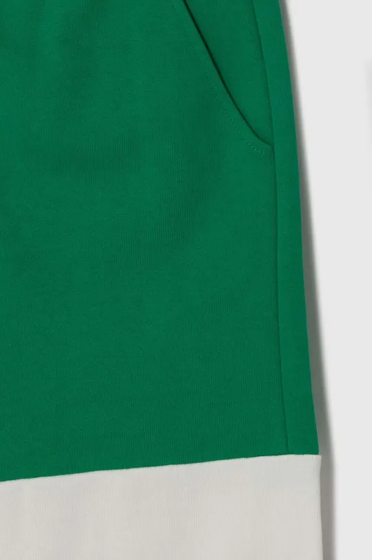 Детские спортивные штаны United Colors of Benetton Основной материал: 94% Хлопок, 6% Вискоза Вставки: 100% Хлопок