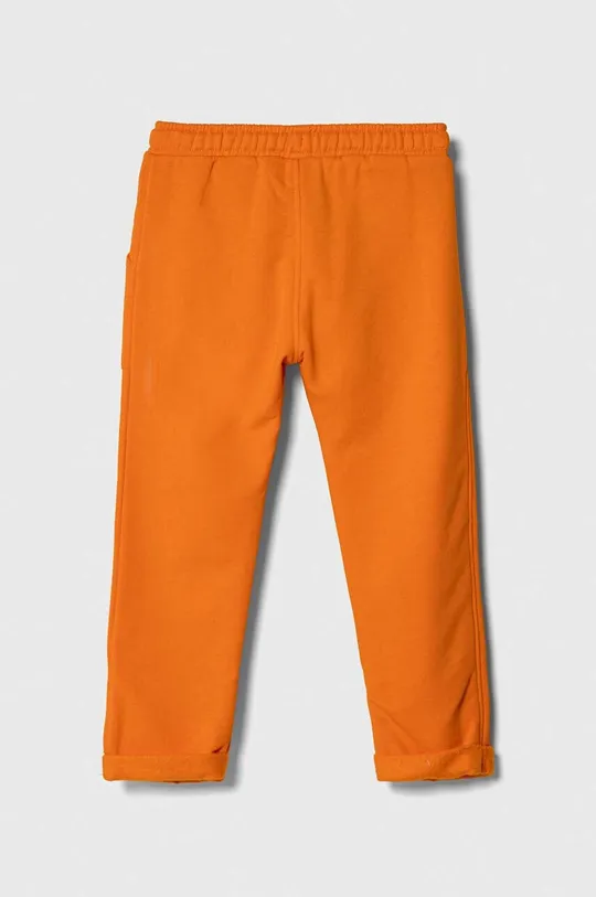 United Colors of Benetton spodnie dresowe dziecięce pomarańczowy