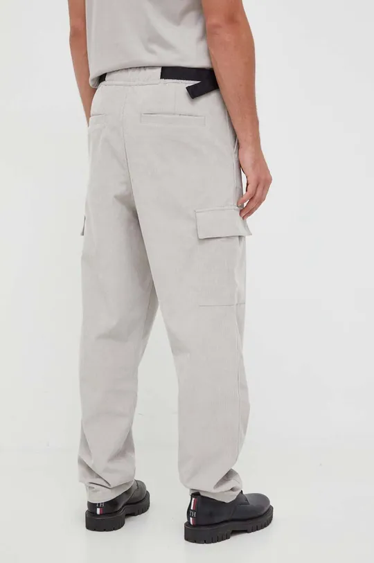 Hlače Calvin Klein Jeans Temeljni materijal: 90% Poliester, 10% Poliamid Postava džepova: 100% Poliester