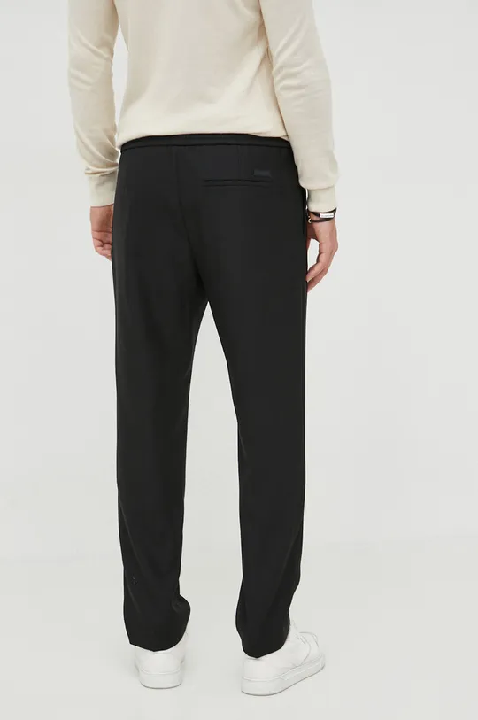 Calvin Klein spodnie wełniane Materiał zasadniczy: 100 % Wełna, Podszewka kieszeni: 65 % Poliester, 35 % Bawełna