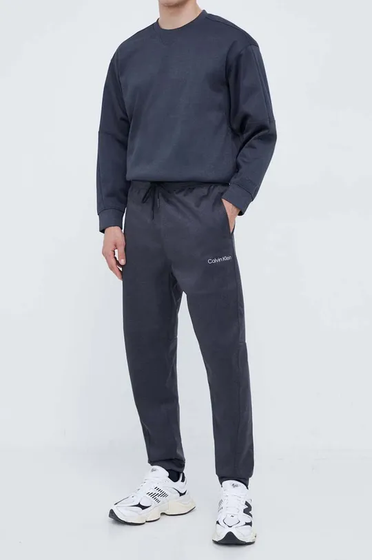 sivá Tréningové nohavice Calvin Klein Performance Pánsky