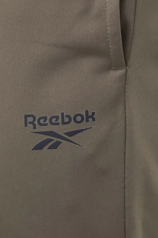 зелений Спортивні штани Reebok