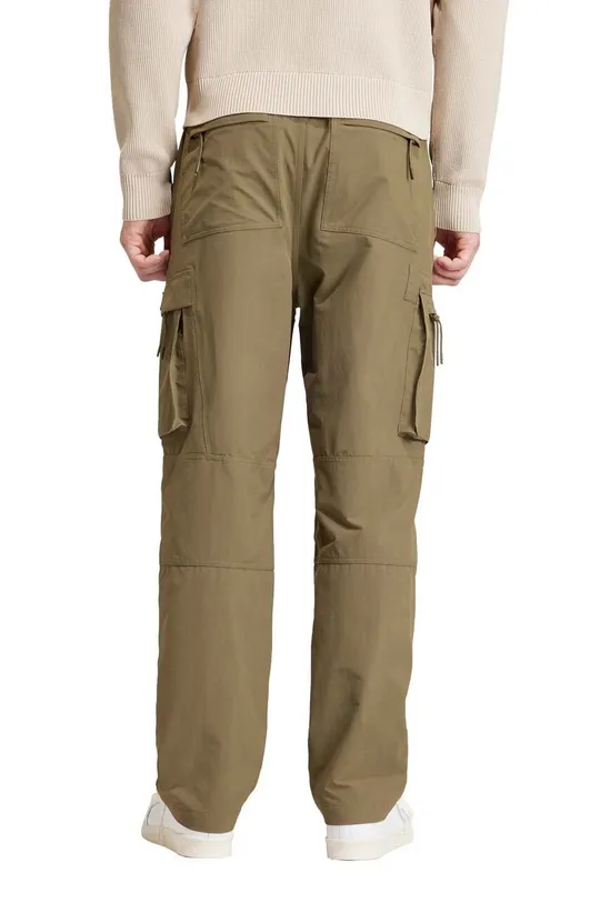 Kalhoty adidas Originals Rossendale SPZL <p>95 % Polyamid, 5 % Elastan</p>