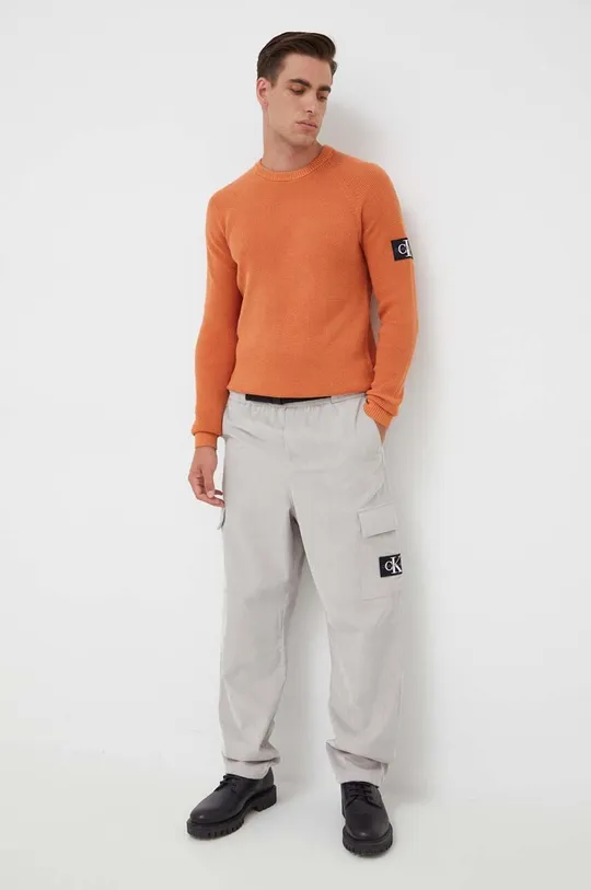 Βαμβακερό πουλόβερ Calvin Klein Jeans πορτοκαλί