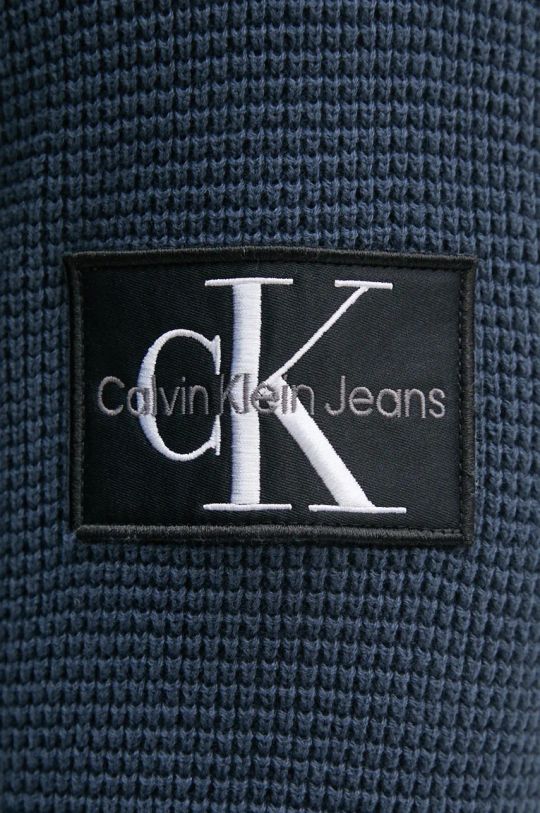 Pamučni pulover Calvin Klein Jeans J30J323989 mornarsko plava