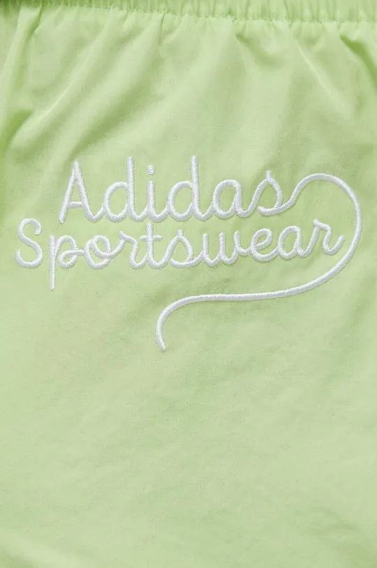 зелений Шорти adidas