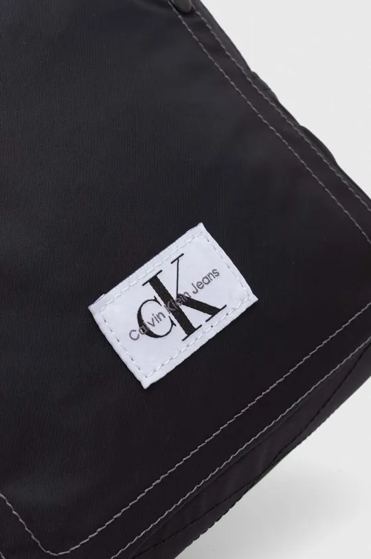 Malá taška Calvin Klein Jeans 57 % Recyklovaný polyamid, 43 % Recyklovaný polyester