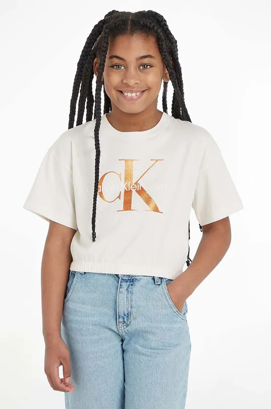 бежевий Дитяча бавовняна футболка Calvin Klein Jeans Для дівчаток