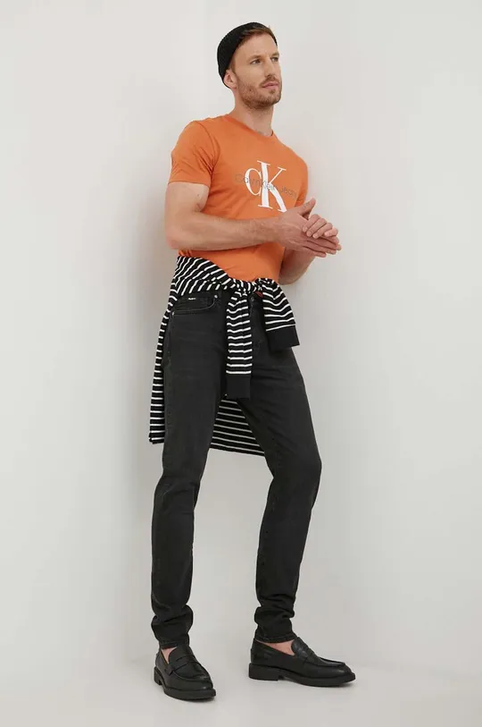 Bombažna kratka majica Calvin Klein Jeans oranžna