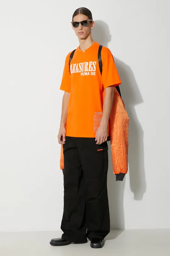 Βαμβακερό μπλουζάκι Puma PUMA x PLEASURES Typo Tee πορτοκαλί