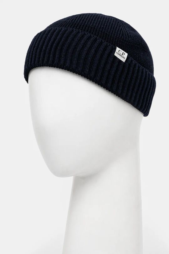 Αξεσουάρ Καπέλο C.P. Company Knit Cap In Re-Wool 17CMAC293A006595A σκούρο μπλε