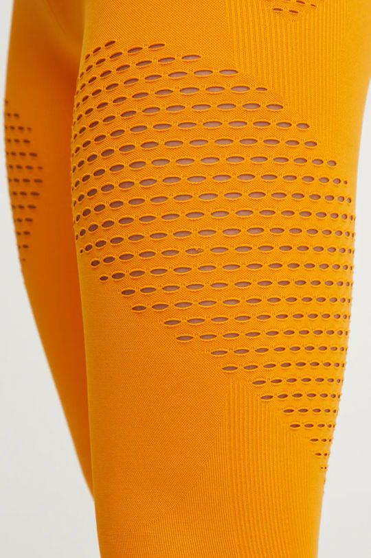 adidas by Stella McCartney legginsy TrueStrenght pomarańczowy IV9190