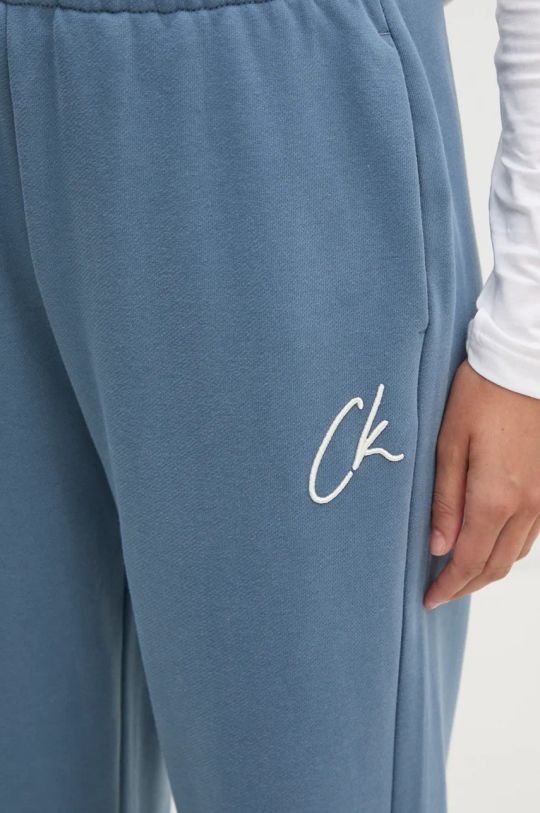 Бавовняні спортивні штани Calvin Klein Jeans J20J224441 блакитний