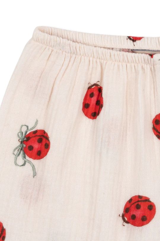 Dětské bavlněné kalhoty Konges Sløjd COCO LADYBUG PANTS GOTS béžová KS102214