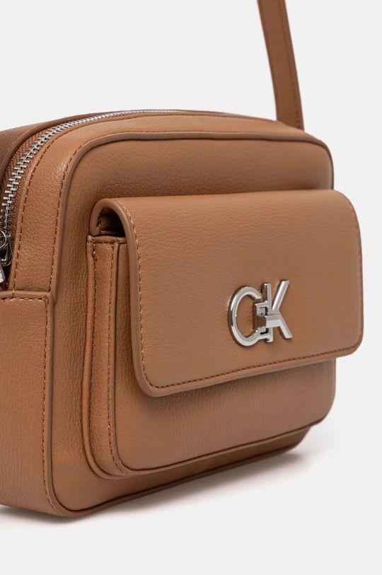 Doplňky Kabelka Calvin Klein K60K612538 hnědá