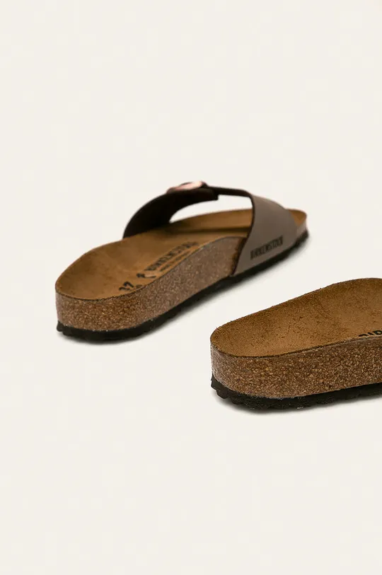 Birkenstock sliders  Uppers: Synthetic material Inside: Natural leather Outsole: Synthetic material