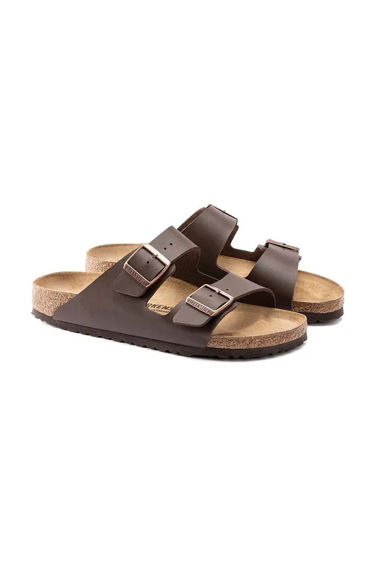 Birkenstock sliders  Uppers: Synthetic material Inside: Natural leather Outsole: Synthetic material