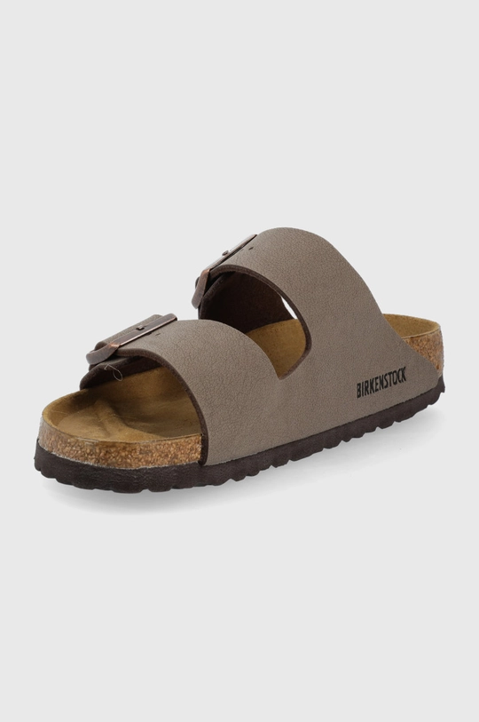 Birkenstock sliders  Uppers: Synthetic material Inside: Textile material, Natural leather Outsole: Synthetic material