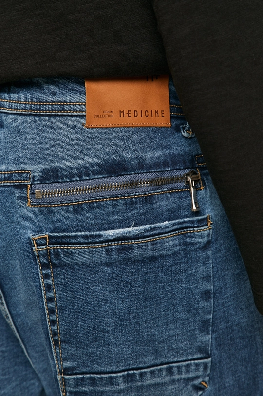 niebieski Jeansy męskie tapered niebieskie