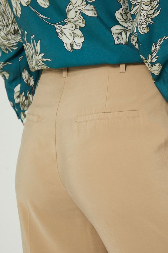 piaskowy Spodnie damskie szerokie high waist beżowe