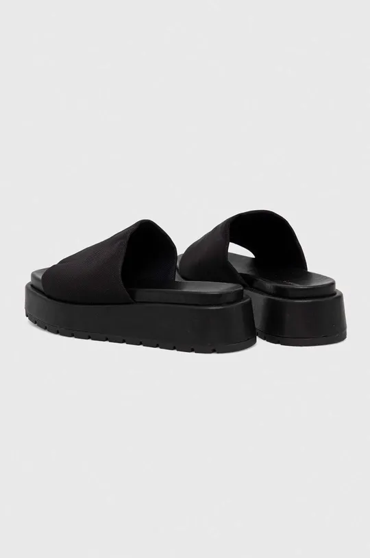 Pantofle dámské černá barva  Svršek: 100 % Polyester Vnitřek: 50 % Polyester, 50 % Polyuretan Podrážka: 100 % TPR