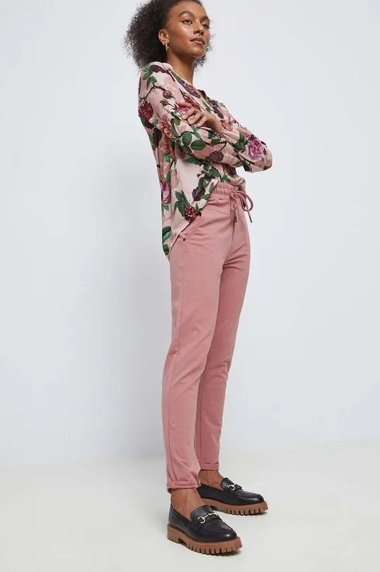różowy Spodnie dresowe damskie gładkie kolor różowy Damski