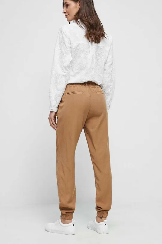 Spodnie damskie gładkie kolor beżowy Materiał zasadniczy: 100 % Lyocell, Inne materiały: 100 % Bawełna